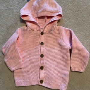 Brand new 100 per cent cotton Pink Knit Button-Up Baby Hoodie.